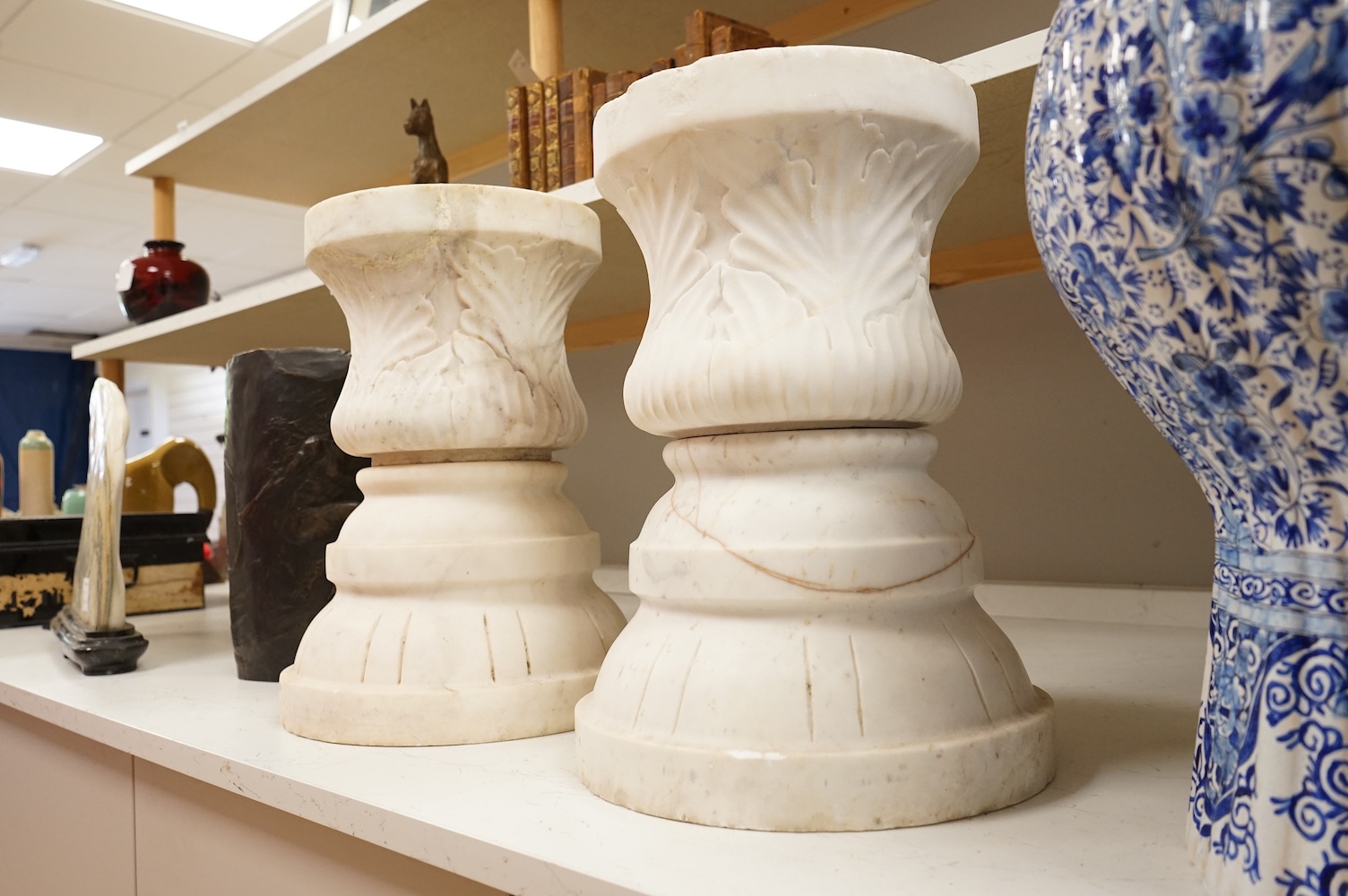 A pair of late 19th century carved marble columns, 40cm